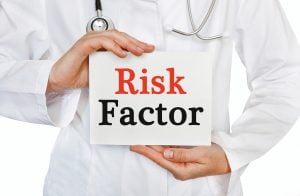 Risk Factor card in hands of Medical Doctor