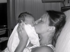 Photo of Amy Dew Dornbusch and infant.