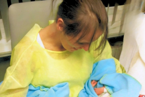 Kristelle Torrekens, a DVT, bilateral pulmonary embolism, and pulmonary infarction survivor diagnosed postpartum at age 34 after giving birth prematurely to twins.