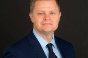 John "JT" Lasker, ESPN executive and NBCA board member, a DVT and pulmonary embolism survivor diagnosed in July 2020 after two nights of severe chest pain were dismissed as indigestion.