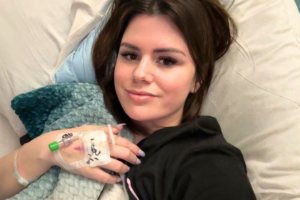 Deborah Brumell, a CVST survivor diagnosed with a rare brain blood clot in an abnormally small vein in March 2025, after being initially sent home from the emergency room with a migraine diagnosis.